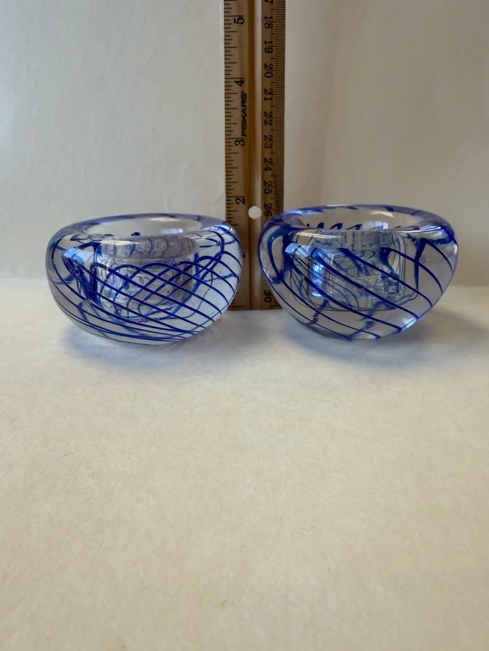 Pair of Handmade Art Glass Paperweight Candle Holders. Clear with Blue Swirl.